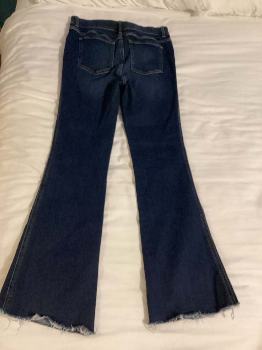 SPANX Flare Jeans in Midnight Shade with Raw Hem